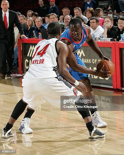 Moses Ehambe of the Tulsa 66ers looks for a way around Donell Taylor of the Idaho Stampede at Qwest Arena on March 19, 2010 in Boise, Idaho. NOTE TO...