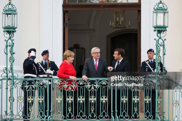 German Chancellor Angela Merkel , French President Emmanuel Macron and President of the EU Commission Jean-Claude Juncker pose for a picture before a...