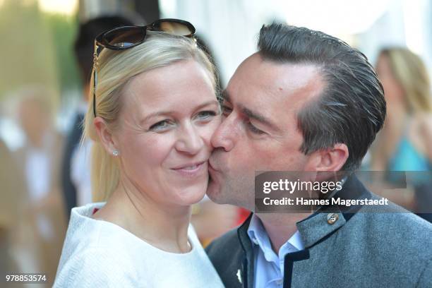 Andrea Muehlbauer and her husband Falk Raudies attend the launch event for watchmaking company NOMOS Glashuette at Juweler Hilscher on June 19, 2018...