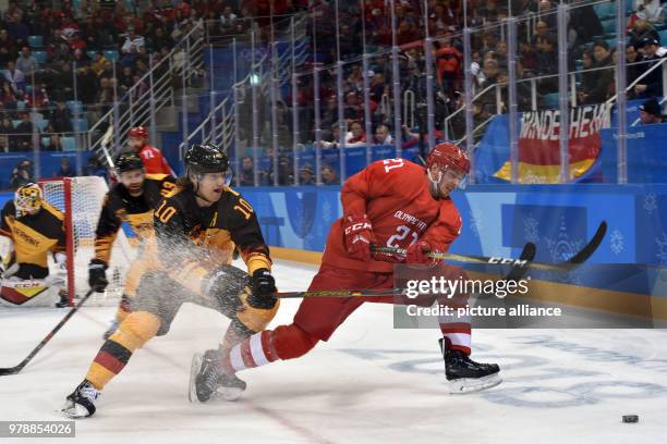 Südkorea, Gangneung: Olympia, Eishockey, Herren, Finale, OAR - Deutschland, Gangneung-Hockey-Zentrum: Christian Ehrhoff aus Deutschland und Sergej...