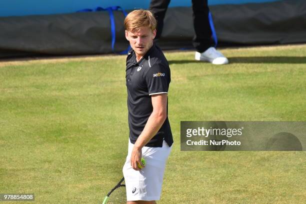 David Goffin of Belgium plays against Spain's Feliciano Lopez during the first singles match on day two of Fever Tree Championships at Queen's Club,...