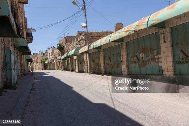 Abandoned Shuhada street of the old town of Hebron which is under Israels military control on June 14, 2018. Most of Palestinians were forced to...