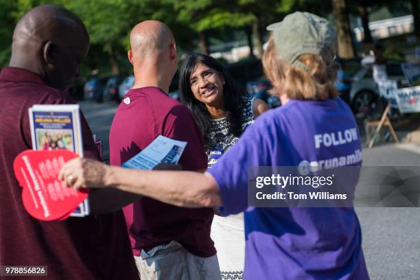 Aruna Miller, who is running for the Democratic nomination for Maryland's 6th Congressional District, talks with citizens during early voting at the...