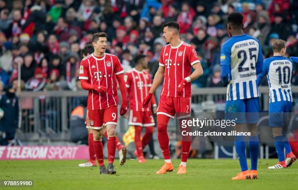 Febuary 2018, Germany, Munich: German Bundesliga soccer match between Bayern Munich and Hertha BSC, Allianz Arena. Bayern's Sandro Wagner discussing...