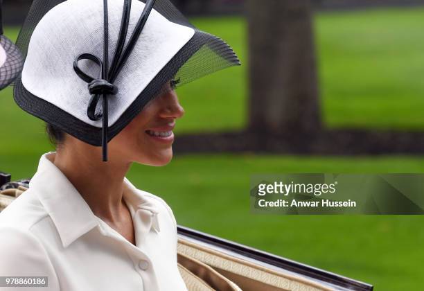Meghan, Duchess of Sussex, making her Royal Ascot debut, arrives in an open carriage to attend the first day of Royal Ascot on June 19, 2018 in...