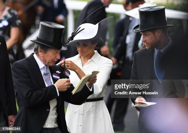 John Warren, Meghan, Duchess of Sussex and Prince Harry, Duke of Sussex attend the first day of Royal Ascot on June 19, 2018 in Ascot, England.