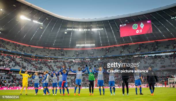 Febuary 2018, Germany, Munich: German Bundesliga soccer match between Bayern Munich and Hertha BSC, Allianz Arena. Hertha's players celebrate after...