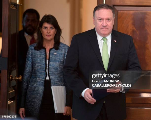 Secretary of State Mike Pompeo and US Ambassador to the United Nation Nikki Haley arrive at a press conference at the US Department of State in...