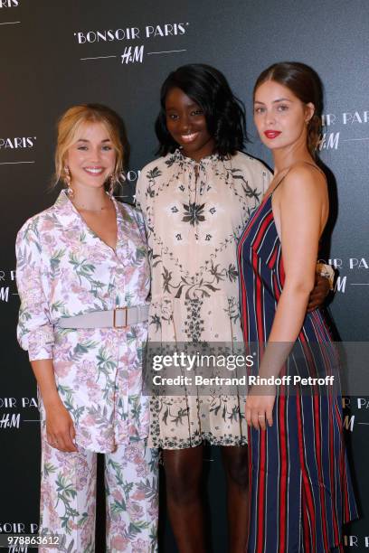 Muses of H&M Alice Isaaz, Karidja Toure and Marie-Ange Casta attend the H&M Flaship Opening Party as part of Paris Fashion Week on June 19, 2018 in...