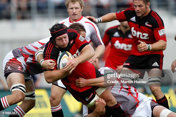 Thomas Waldrom of the Crusaders is tackled during the round six Super 14 match between the Crusaders and the Lions at AMI Stadium on March 20, 2010...