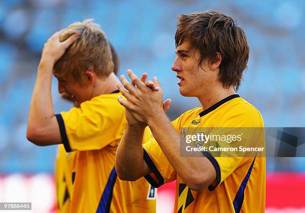 Joshua Brillante of the Gold Coast applauds dans after winning the 2010 National Youth League Grand Final match at Etihad Stadium on March 20, 2010...