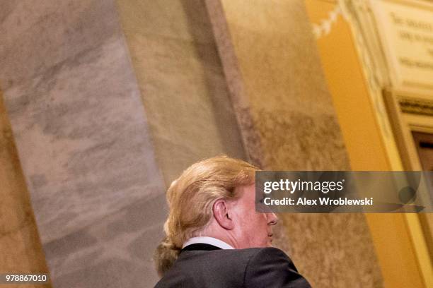 President Donald Trump leaves Capitol Hill on June 19, 2018 in Washington, DC. The President addressed the house Republican conference about...