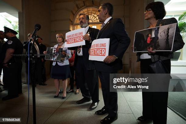 Rep. Lucille Roybal-Allard , Rep. Adriano Espaillat , Rep. Juan Vargas and Rep. Michelle Lujan Grisham hold signs as they stage a protest outside a...