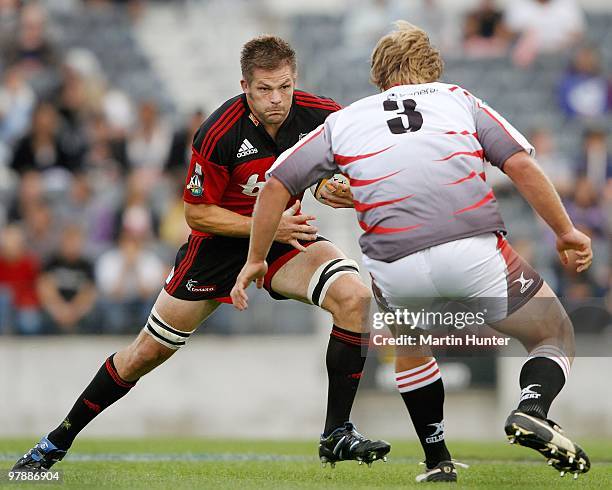 Richie McCaw of the Crusaders lines up Ross Geldenhuys of the Lions during the round six Super 14 match between the Crusaders and the Lions at AMI...