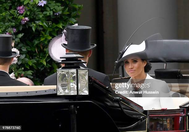 Meghan, Duchess of Sussex, making her Royal Ascot debut, arrives in an open carriage to attend the first day of Royal Ascot on June 19, 2018 in...