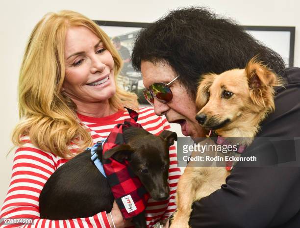 Gene Simmons of KISS and wife Shannon Tweed make a surprise appearance at Wags & Walks Dog Rescue To deliver toys and treats provided by...