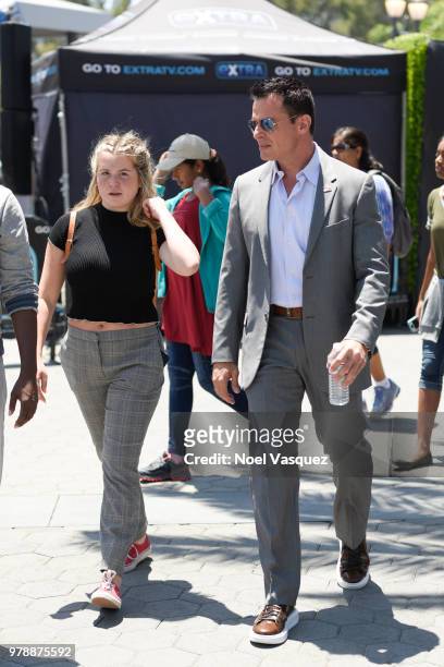 Mina Bree Sabato and Antonio Sabato Jr. Visit "Extra" at Universal Studios Hollywood on June 19, 2018 in Universal City, California.