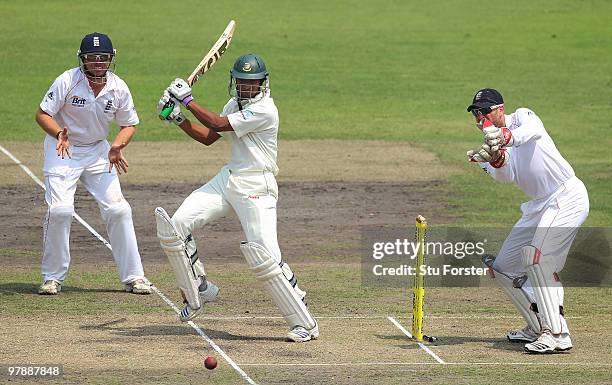 Bangladesh batsman Shakib Al Hasan hits out as England fielder Ian Bell and Matt Prior look on during day one of the 2nd Test match between...