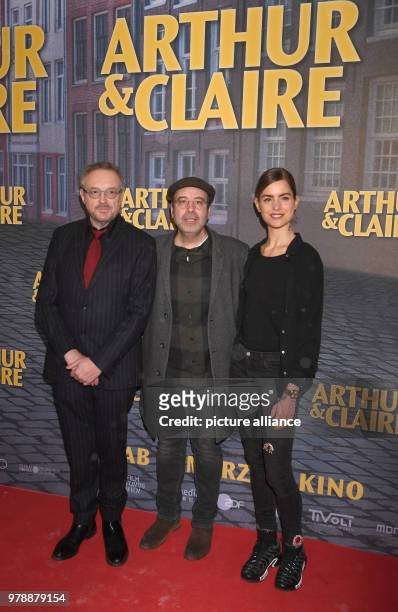 February 2018, Germany, Munich: Actors Josef Hader , Hannah Hoekstra and director Miguel Alexandre arrive for the premiere of the film 'Arthur &...