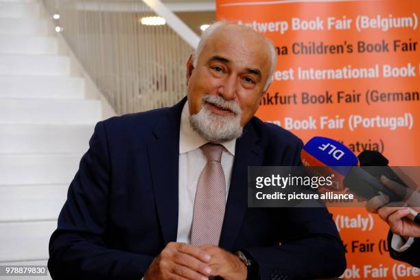 January 2018, Romania, Bukarest: The author and politician Varujan Vosgonian during a press conference. He is represented at the Leipzig Book Fair...