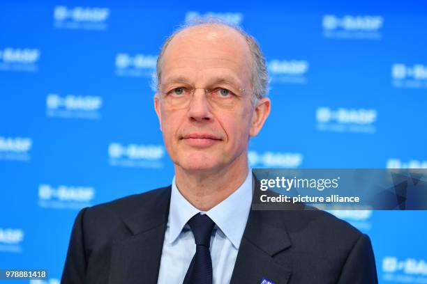 February 2018, Germany, Ludwigshafen: Kurt Bock, CEO of the chemicals producer BASF, sits on the panel during the press conference on the company's...