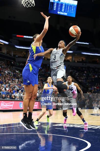 Danielle Robinson of the Minnesota Lynx goes to the basket against the Dallas Wings on June 19, 2018 at Target Center in Minneapolis, Minnesota. NOTE...