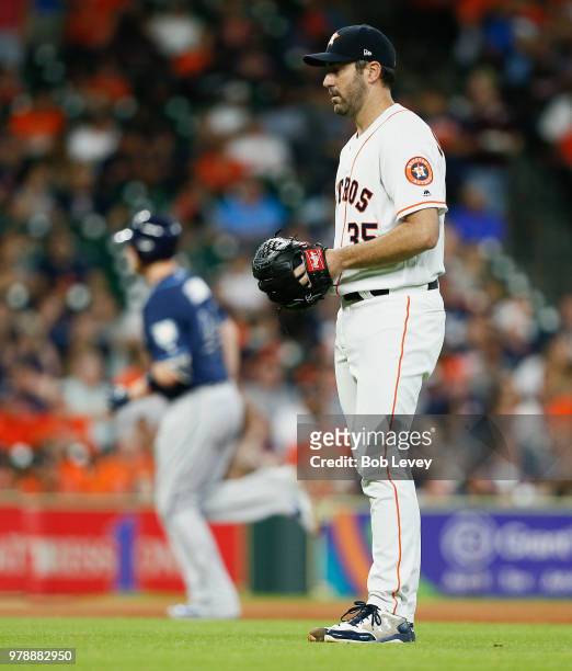 Justin Verlander of the Houston Astros gives up a home run to C.J. Cron of the Tampa Bay Rays in the second inning at Minute Maid Park on June 19,...