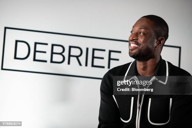 Dwyane Wade, a professional basketball player with the National Basketball Association's Miami Heat, smiles during a Bloomberg Businessweek Debrief...