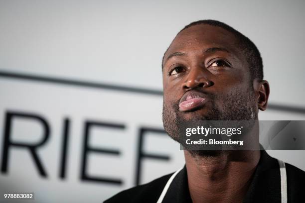 Dwyane Wade, a professional basketball player with the National Basketball Association's Miami Heat, pauses during a Bloomberg Businessweek Debrief...