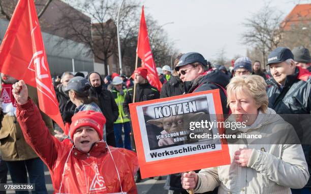 February 2018, Germany, Berlin: Employees of the company Ledvance that is threatened with closure attend a rally of IG Metall outside the Siemes...