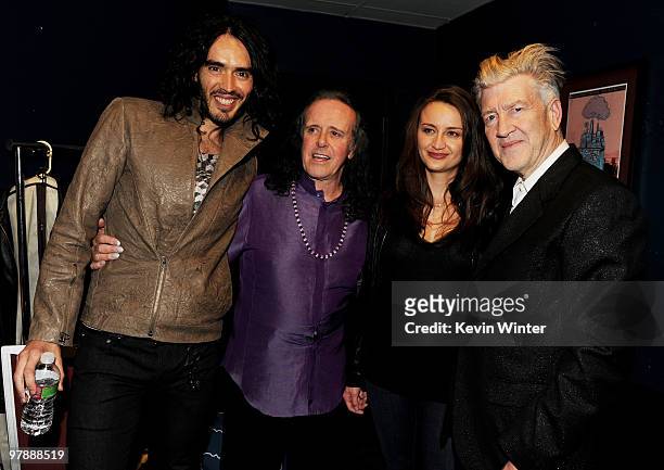 Actor Russell Brand, singer/songwriter Donovan, actress Emily Stofle Lynch and husband director David Lynch pose backstage at a concert to benefit...