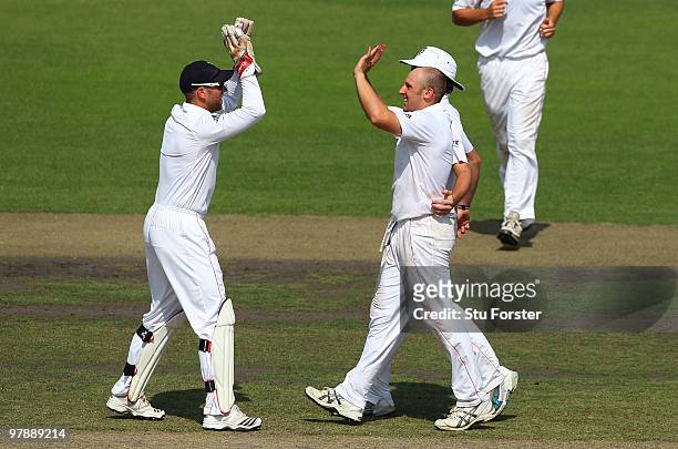 England bowler James Tredwell celebrates with wicketkeeper Matt Prior after taking the wicket of Shakib Al Hasan during day one of the 2nd Test match...