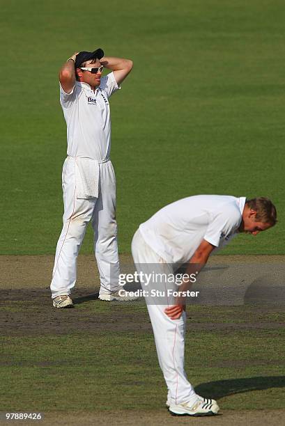 England fielder Ian Bell and bowler Stuart Broad look on dejectedly during day one of the 2nd Test match between Bangladesh and England at...