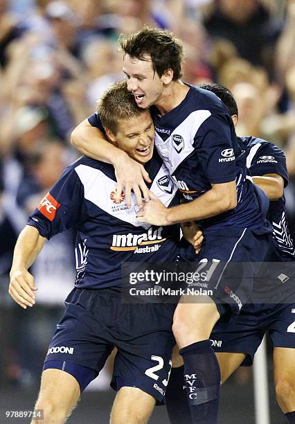 Adrian Leijer and Robbie Kruse of Melbourne celebrate a goal by Leijer during the A-League Grand Final match between the Melbourne Victory and Sydney...