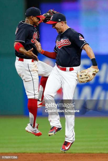 Francisco Lindor and Lonnie Chisenhall of the Cleveland Indians celebate a 6-3 victory over the Chicago White Sox at Progressive Field on June 19,...