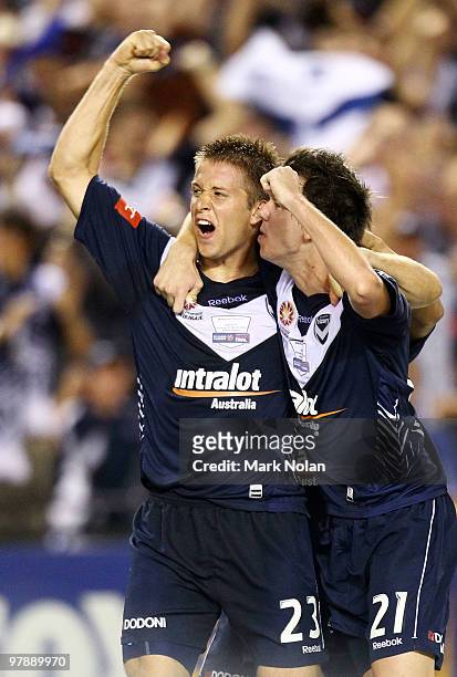 Adrian Leijer and Robbie Kruse of Melbourne celebrate a goal by Leijer during the A-League Grand Final match between the Melbourne Victory and Sydney...