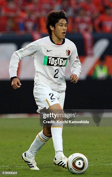 Atsuto Uchida of Kashima Antlers in action during the J.League match between Omiya Ardija and Kashima Antlers at Nack 5 Stadium on March 20, 2010 in...