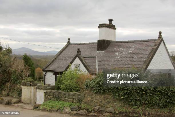 February 2018, Great Britain, Llanfairpwllgwyngyllgogerychwyrndrobwllllantysiliogogogoch: An old Welsh house. A smart shoemaker came up with the name...