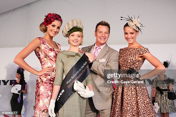 Laura Dundovic with Fashions on the Field winner Stephanie Meneve, Richard Reid and Rachael Finch pose at Myer Ladies Day as part of the Golden...