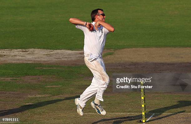England bowler Graeme Swann in action during day one of the 2nd Test match between Bangladesh and England at Shere-e-Bangla National Stadium on March...