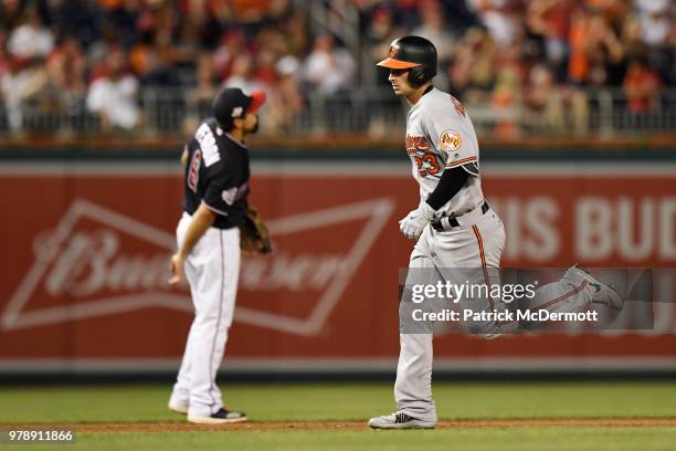 Joey Rickard of the Baltimore Orioles runs the bases after hitting a solo home run in the ninth inning against the Washington Nationals at Nationals...