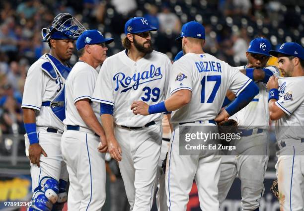 Jason Hammel starting pitcher of the Kansas City Royals leaves the mound after being taken out of a game against the Texas Rangers at Kauffman...