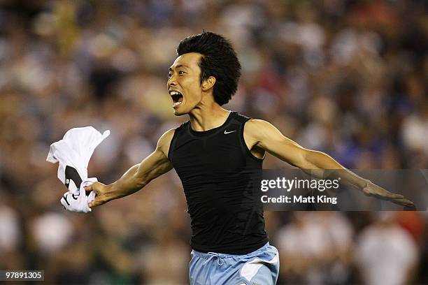 Sung-Hwan Byun of Sydney celebrates after scoring the final penalty shoot-out goal for victory during the A-League Grand Final match between the...