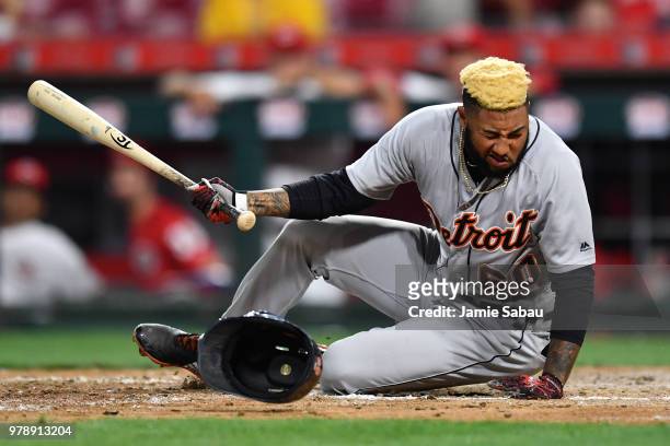 Ronny Rodriguez of the Detroit Tigers falls to the ground as he avoids an inside pitch in the ninth inning against the Cincinnati Reds at Great...
