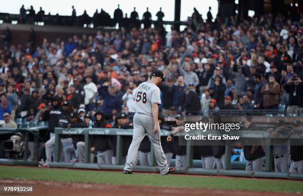 Dan Straily of the Miami Marlins leaves the game in the second inning after he was ejected for hitting Buster Posey of the San Francisco Giants at...