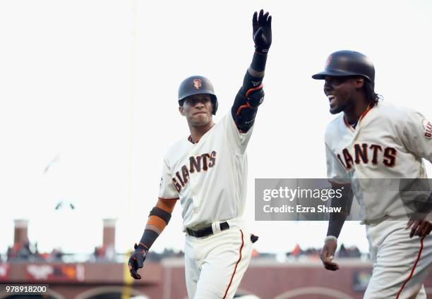 Gorkys Hernandez of the San Francisco Giants waves to the crowd after he hit a home run off of Dan Straily of the Miami Marlins in the second inning...