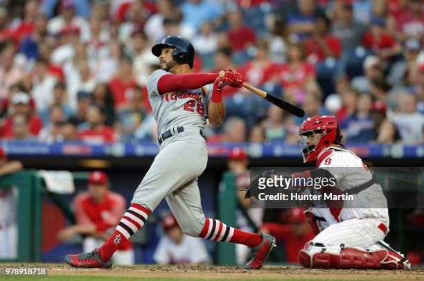 Tommy Pham of the St. Louis Cardinals hits a solo home run to left field in the third inning during a game against the Philadelphia Phillies at...