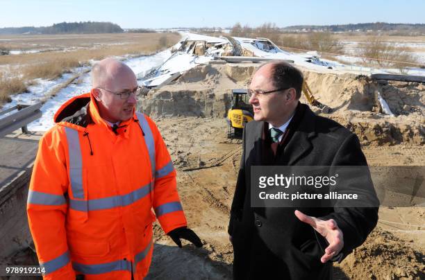 Federal Transportation Minister Christian Schmidt being briefed by State Transportation Minister Christian Pegel on the damages at the sunken Baltic...