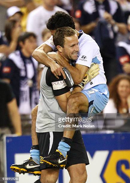 Simon Colosimo and Clint Bolton of Sydney celebrate winning the A-League Grand Final match between the Melbourne Victory and Sydney FC at Etihad...