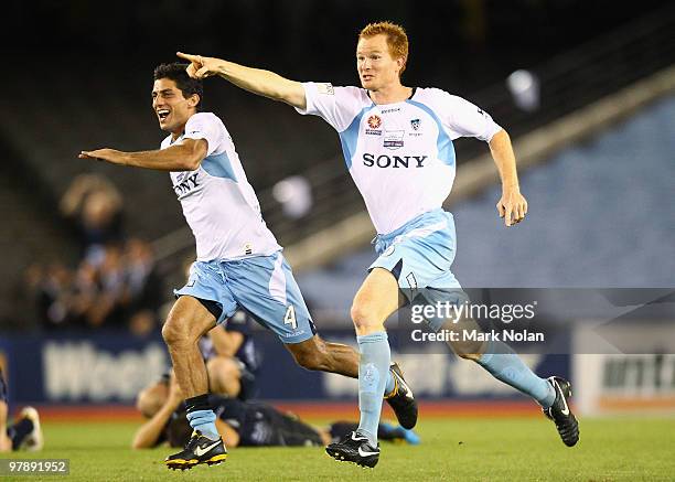 Simon Colosimo and Hayden Foxe of Sydney celebrate winning the A-League Grand Final match between the Melbourne Victory and Sydney FC at Etihad...